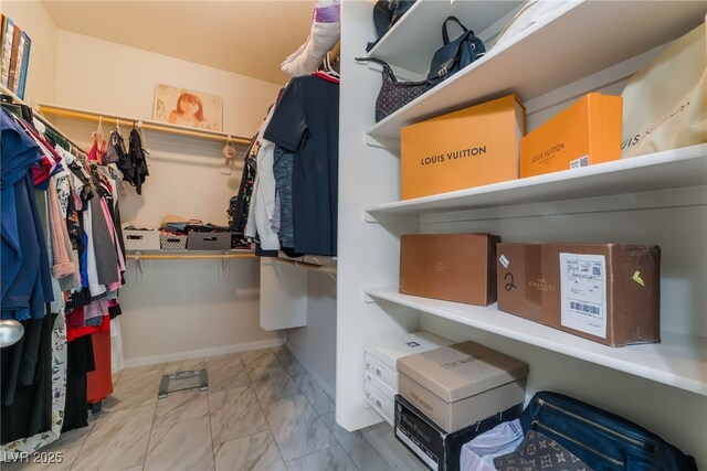 184 Cullerton St, Las Vegas, NV 89148 - walk in closet featuring marble look tile flooring
