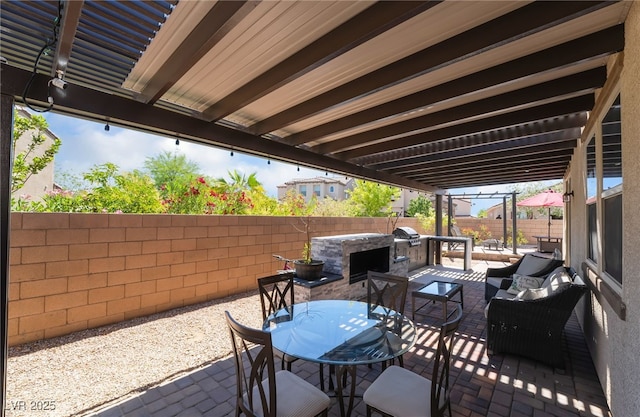184 Cullerton St, Las Vegas, NV 89148 - view of patio / terrace with a fenced backyard, an outdoor living space, outdoor dining area, and grilling area