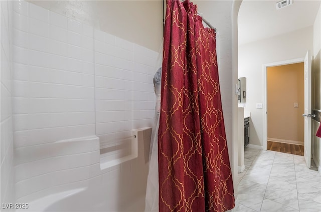 184 Cullerton St, Las Vegas, NV 89148 - full bath with marble finish floors, vanity, and curtained shower