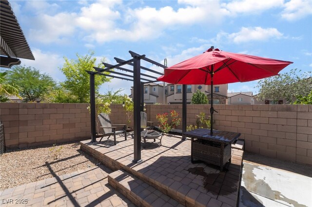 184 Cullerton St, Las Vegas, NV 89148 - view of patio / terrace with a fire pit, fence, and a pergola