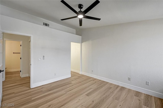 2725 S Nellis Blvd Unit 2036, Las Vegas, NV 89121 - empty room featuring light wood finished floors, baseboards, and a ceiling fan