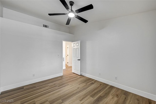 2725 S Nellis Blvd Unit 2036, Las Vegas, NV 89121 - empty room featuring baseboards, wood finished floors, and ceiling fan