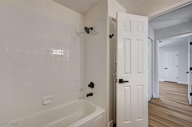 2725 S Nellis Blvd Unit 2036, Las Vegas, NV 89121 - full bath with shower / bathtub combination, wood finished floors, and baseboards
