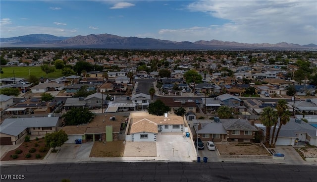 aerial perspective of suburban area featuring a mountainous background