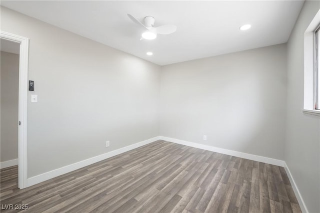 empty room featuring wood finished floors, baseboards, a ceiling fan, and recessed lighting