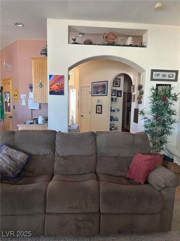 3551 Sagebrush Ave, Pahrump, NV 89048 - living room featuring arched walkways