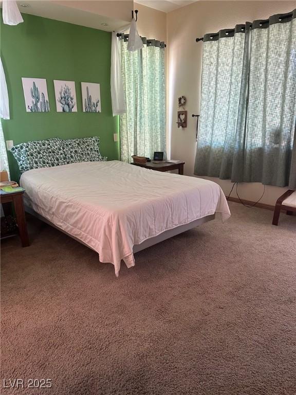 3551 Sagebrush Ave, Pahrump, NV 89048 - bedroom featuring carpet floors and multiple windows