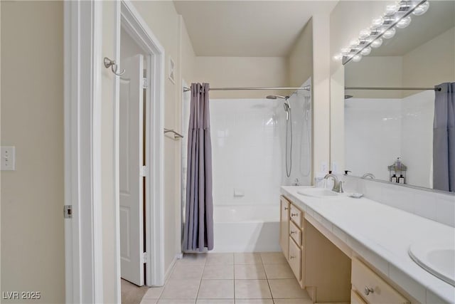 2325 Windmill Pkwy Unit 321, Henderson, NV 89074 - bathroom featuring double vanity, shower / tub combo with curtain, and tile patterned floors