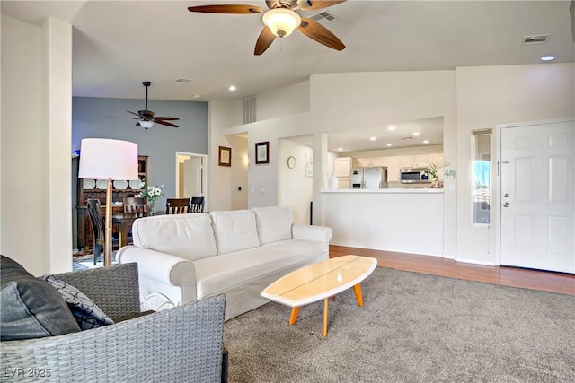 2325 Windmill Pkwy Unit 321, Henderson, NV 89074 - living room with ceiling fan, wood finished floors, and recessed lighting