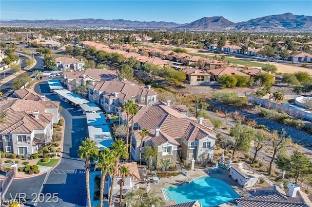 2325 Windmill Pkwy Unit 321, Henderson, NV 89074 - aerial perspective of suburban area with a mountainous background and a pool area