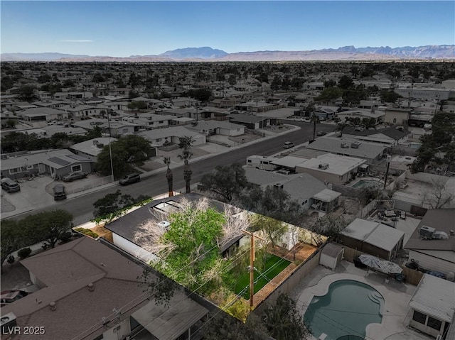 aerial perspective of suburban area featuring mountains