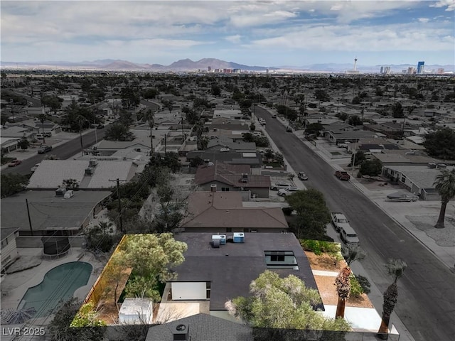 aerial perspective of suburban area featuring mountains