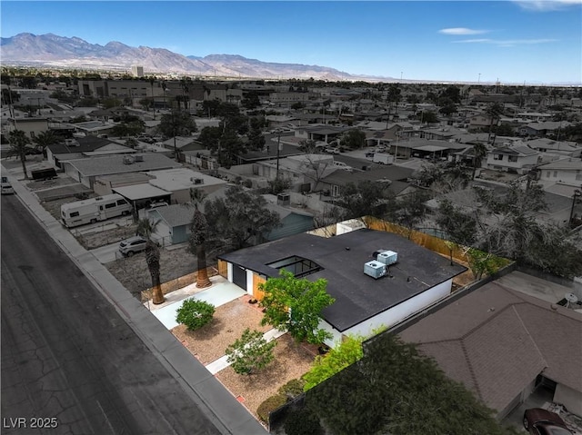 aerial perspective of suburban area with a mountain backdrop