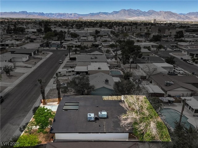 aerial perspective of suburban area featuring mountains