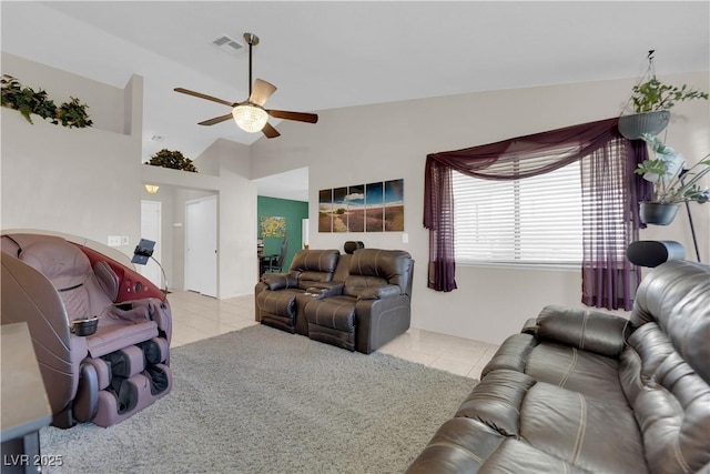 5884 Deer Valley Dr, Las Vegas, NV 89156 - living area with light tile patterned floors, ceiling fan, and vaulted ceiling