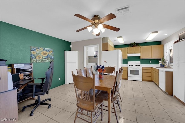 5884 Deer Valley Dr, Las Vegas, NV 89156 - dining area featuring ceiling fan, a desk, and light tile patterned floors
