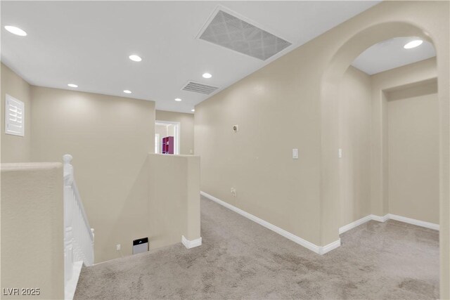 7183 Majestic Bluff Pl, Las Vegas, NV 89113 - spare room with carpet flooring, arched walkways, baseboards, and recessed lighting