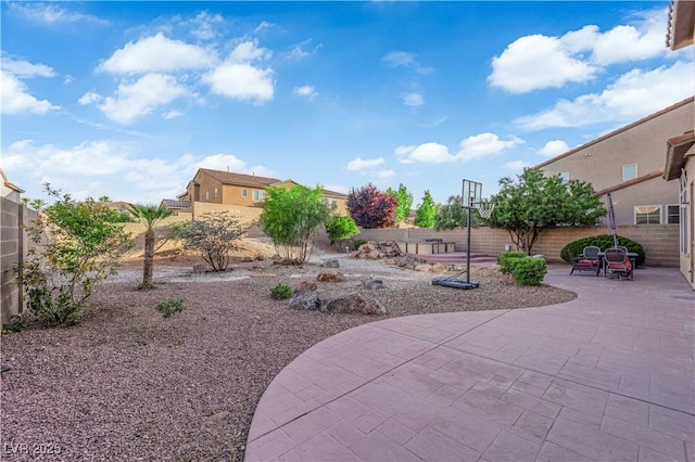 7183 Majestic Bluff Pl, Las Vegas, NV 89113 - fenced backyard featuring a patio