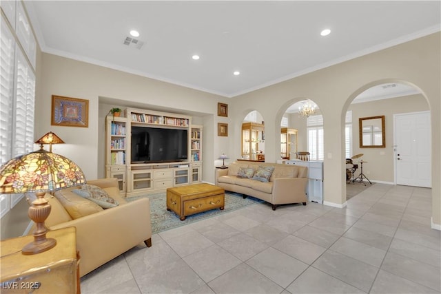 7183 Majestic Bluff Pl, Las Vegas, NV 89113 - living area featuring arched walkways, crown molding, light tile patterned flooring, recessed lighting, and baseboards