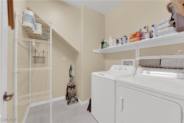 7183 Majestic Bluff Pl, Las Vegas, NV 89113 - laundry area with independent washer and dryer, baseboards, and light tile patterned floors