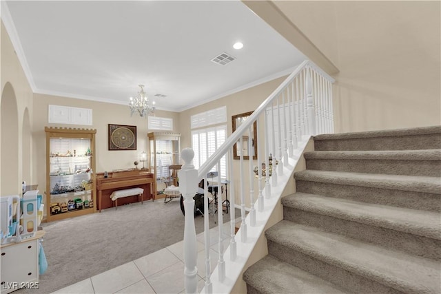7183 Majestic Bluff Pl, Las Vegas, NV 89113 - stairs featuring carpet flooring, arched walkways, tile patterned floors, a chandelier, and ornamental molding