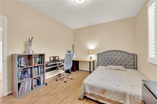 7183 Majestic Bluff Pl, Las Vegas, NV 89113 - bedroom featuring wood finished floors, multiple windows, an office area, and baseboards