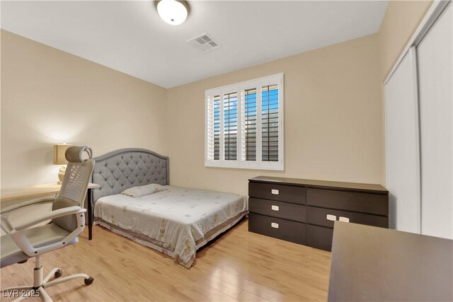 7183 Majestic Bluff Pl, Las Vegas, NV 89113 - bedroom featuring wood finished floors and a closet