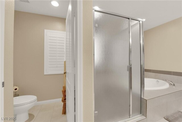 7183 Majestic Bluff Pl, Las Vegas, NV 89113 - bathroom with a shower stall, a bath, toilet, and tile patterned flooring