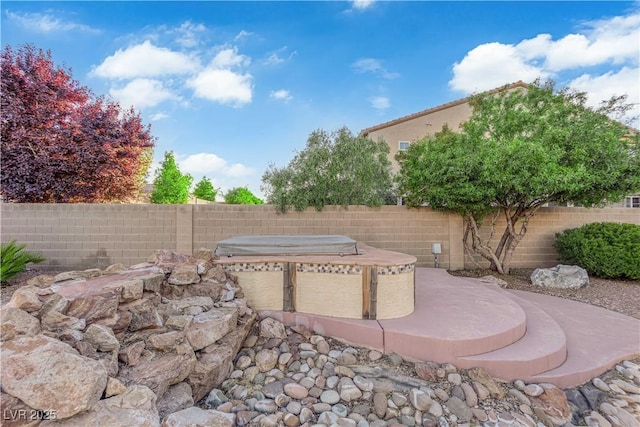7183 Majestic Bluff Pl, Las Vegas, NV 89113 - fenced backyard featuring a hot tub