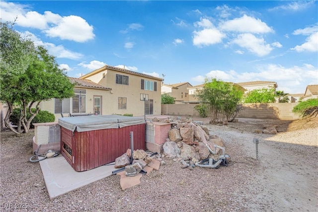 7183 Majestic Bluff Pl, Las Vegas, NV 89113 - fenced backyard with a hot tub