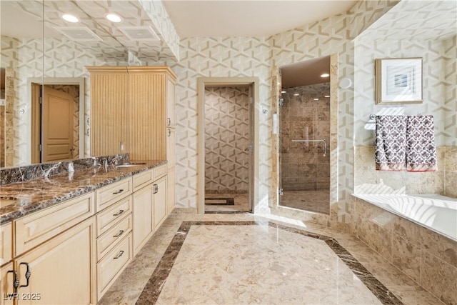 360 E Desert Inn Rd Unit 1901, Las Vegas, NV 89109 - full bathroom featuring inlaid floor details, a shower stall, double vanity, and recessed lighting