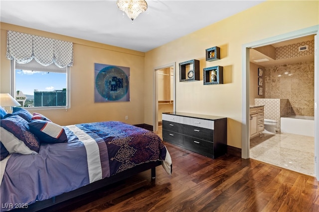 360 E Desert Inn Rd Unit 1901, Las Vegas, NV 89109 - bedroom with wood finished floors and ensuite bathroom