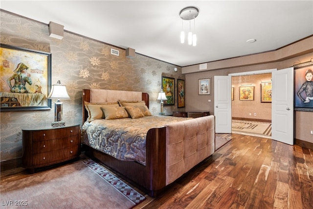 360 E Desert Inn Rd Unit 1901, Las Vegas, NV 89109 - bedroom featuring wood finished floors, wallpapered walls, ornamental molding, and baseboards