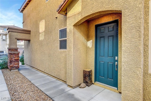 10735 Galveston Bay St, Las Vegas, NV 89179 - entrance to property featuring stucco siding