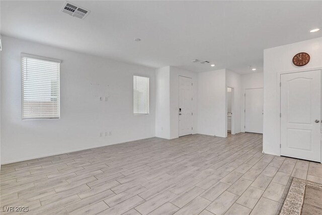 10735 Galveston Bay St, Las Vegas, NV 89179 - spare room featuring light wood-style floors and recessed lighting