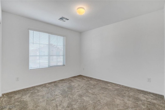 10735 Galveston Bay St, Las Vegas, NV 89179 - spare room with carpet floors and baseboards