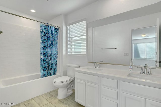 10735 Galveston Bay St, Las Vegas, NV 89179 - bathroom featuring toilet, plenty of natural light, double vanity, and shower / tub combo with curtain