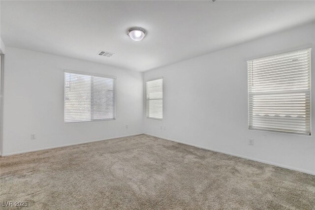 10735 Galveston Bay St, Las Vegas, NV 89179 - carpeted spare room with baseboards
