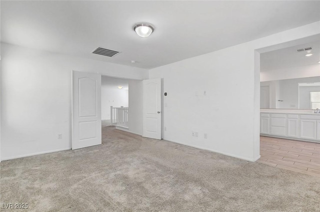 10735 Galveston Bay St, Las Vegas, NV 89179 - unfurnished room featuring light colored carpet and baseboards