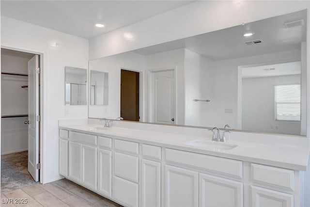 10735 Galveston Bay St, Las Vegas, NV 89179 - full bath featuring double vanity and a spacious closet