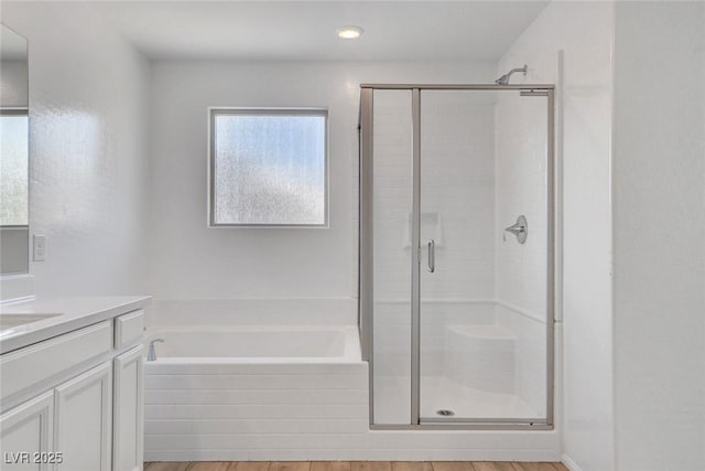 10735 Galveston Bay St, Las Vegas, NV 89179 - bathroom with a stall shower, a bath, and vanity