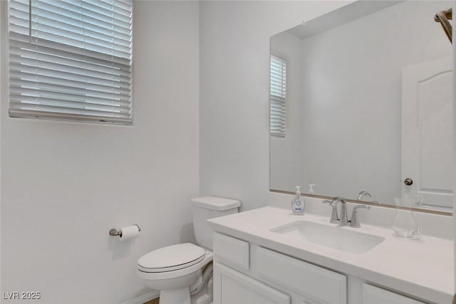 10735 Galveston Bay St, Las Vegas, NV 89179 - half bath with toilet, vanity, and baseboards