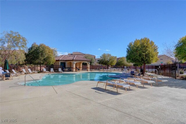 10735 Galveston Bay St, Las Vegas, NV 89179 - community pool featuring fence and a patio area
