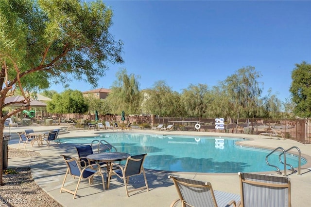 10735 Galveston Bay St, Las Vegas, NV 89179 - community pool featuring fence and a patio