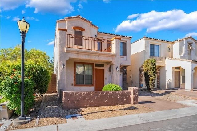 9753 Villa Lorena Ave, Las Vegas, NV 89147 - mediterranean / spanish-style home featuring a balcony, stucco siding, and a tiled roof