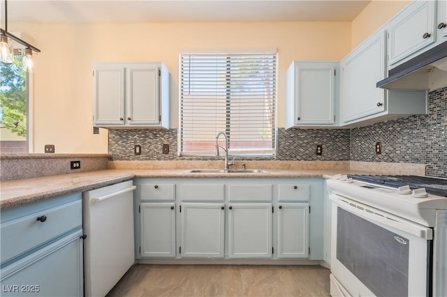 9753 Villa Lorena Ave, Las Vegas, NV 89147 - kitchen featuring white appliances, a sink, light countertops, and decorative backsplash