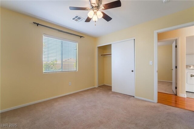 9753 Villa Lorena Ave, Las Vegas, NV 89147 - unfurnished bedroom featuring light colored carpet, washer / clothes dryer, a closet, and baseboards