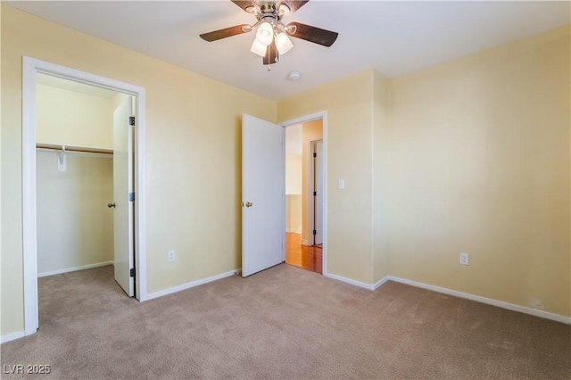 9753 Villa Lorena Ave, Las Vegas, NV 89147 - unfurnished bedroom with carpet floors, baseboards, a spacious closet, a ceiling fan, and a closet