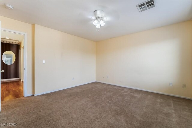 9753 Villa Lorena Ave, Las Vegas, NV 89147 - carpeted empty room with baseboards, ceiling fan, and a smoke detector