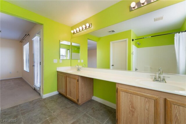 9753 Villa Lorena Ave, Las Vegas, NV 89147 - bathroom with vanity and baseboards